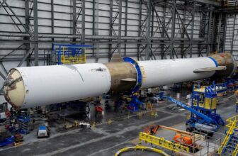 Bezos’ Large Rocket Lastly Assembled After Years of Delays